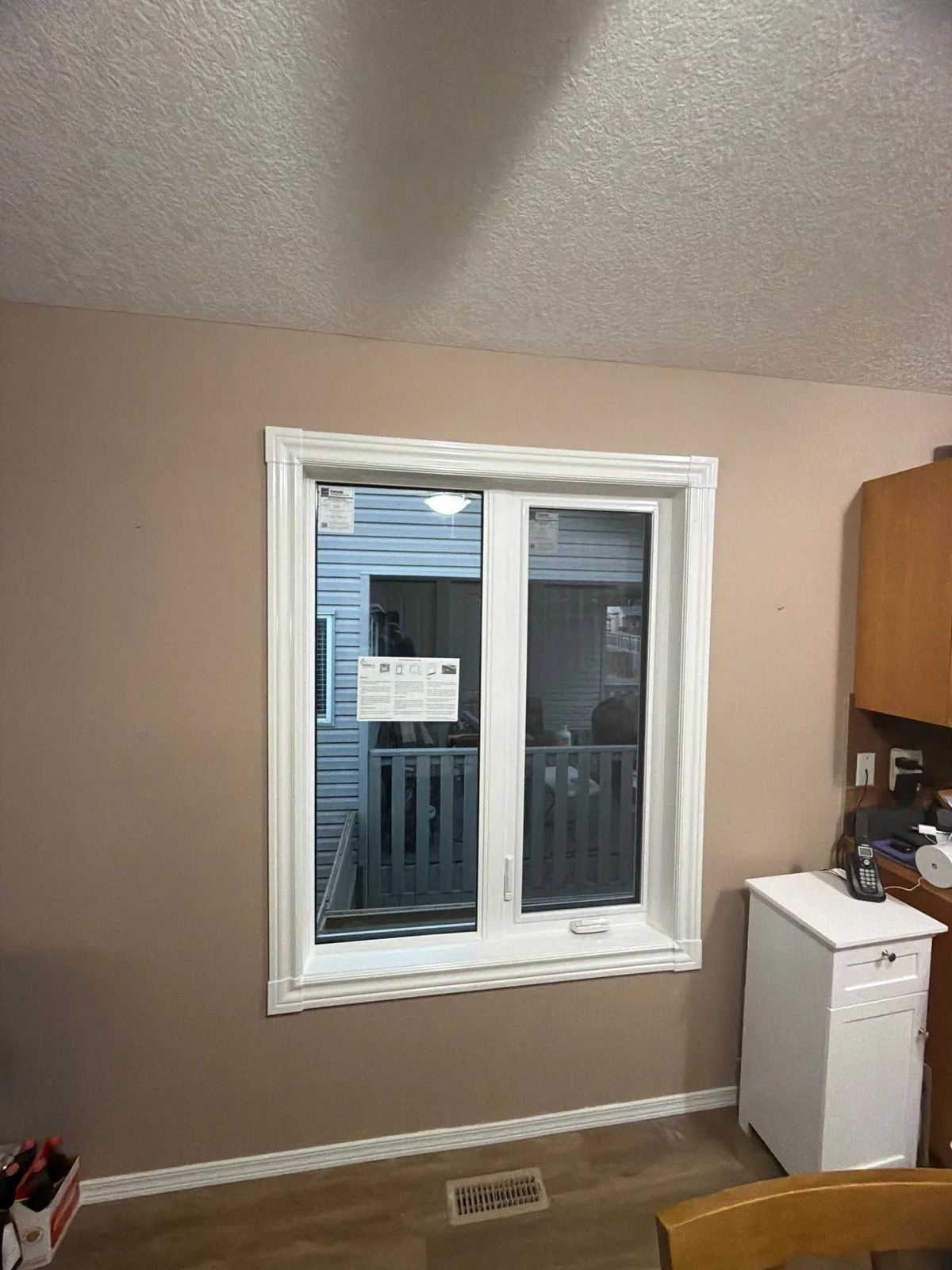 Completed window installation viewed from inside — clean trim and professional finish