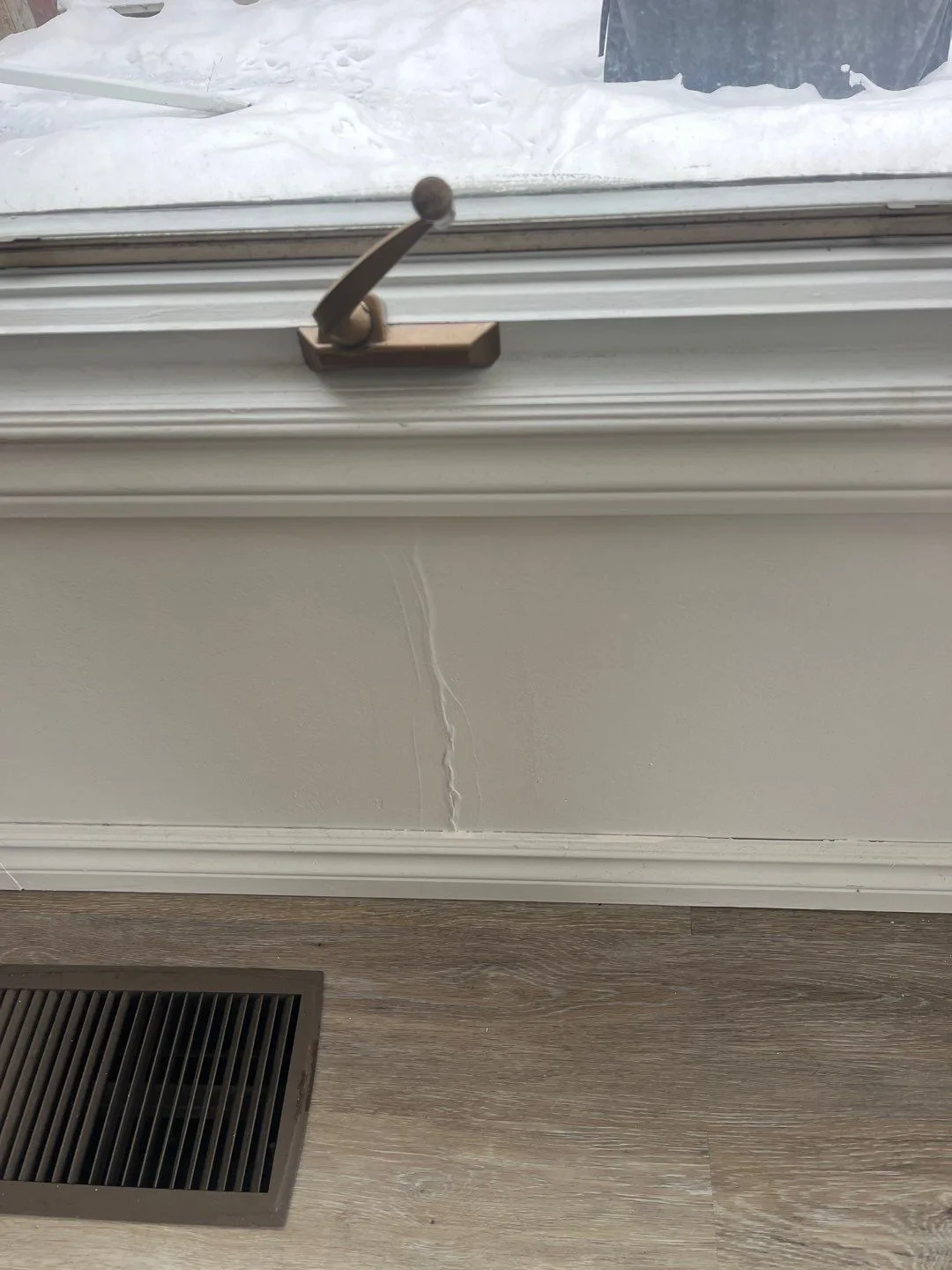 Water damage and rust staining around a window caused by poor installation